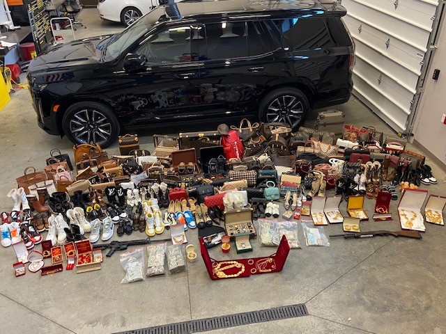 a photo of a black SUV and valuable merchandise that was recovered
