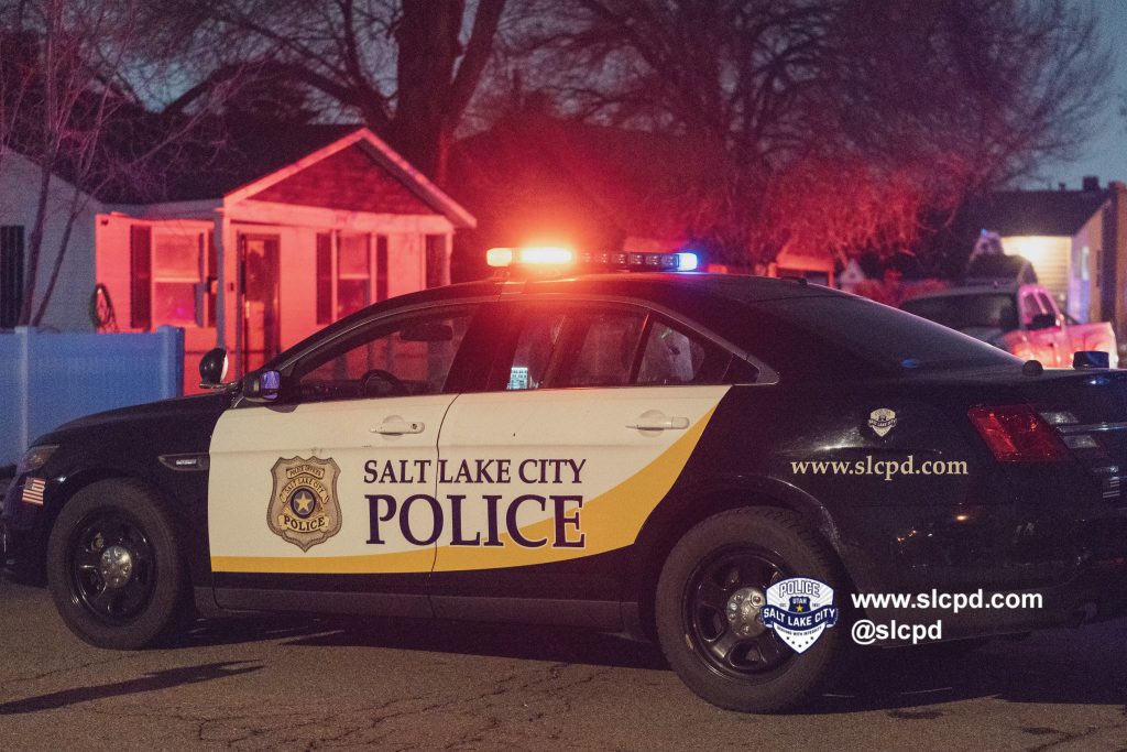A photo of a SLCPD police car at the scene of a shooting on Pacific Avenue in Salt Lake City.