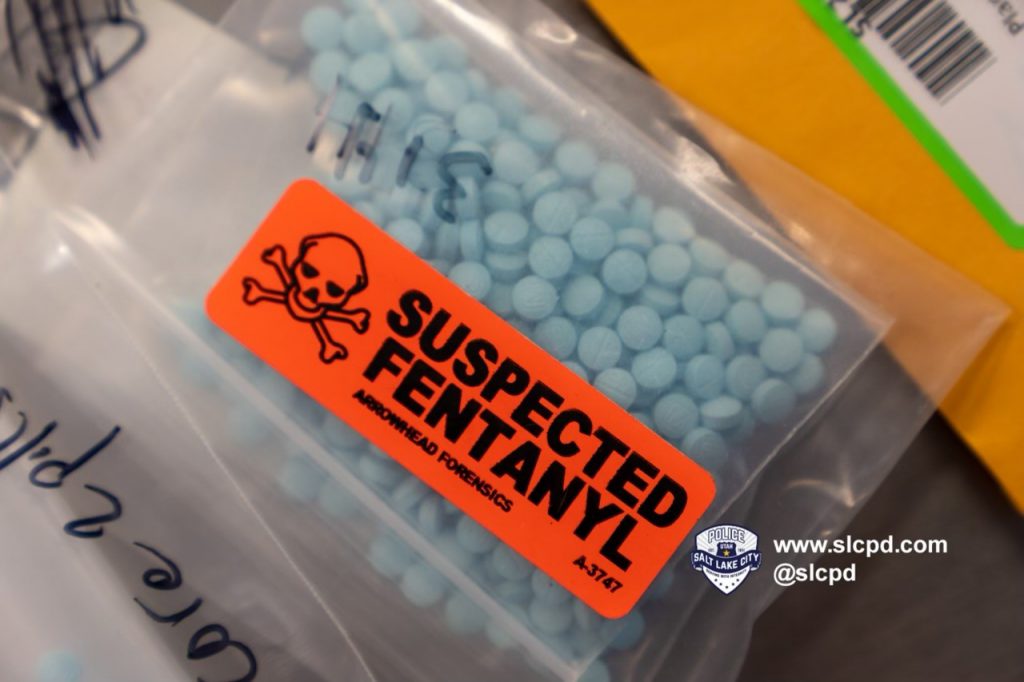 A package of blue M30 pills recently recovered by officers in Salt Lake City.