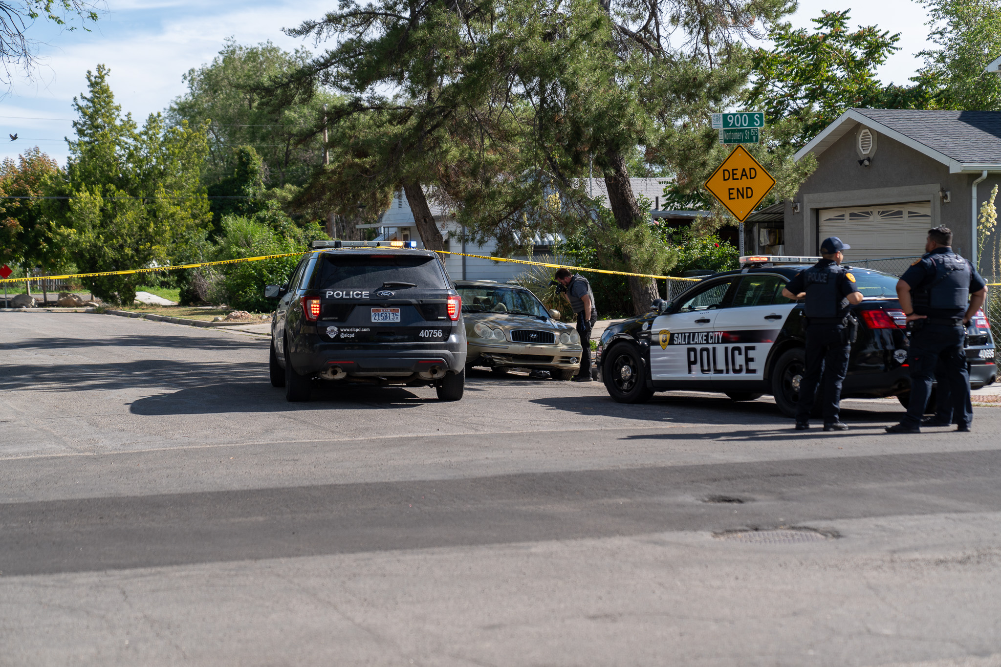 Officers investigate the scene of a shooting on June 22, 2023