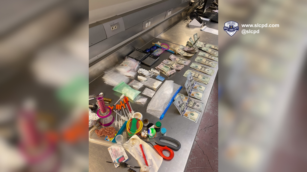1- Photo of cash, drugs and paraphernalia recovered by police. (Salt Lake City Police Department photo | July 22, 2023)