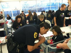 SLCPD Officer Moronae Lealaogata checks list twice -- 2012